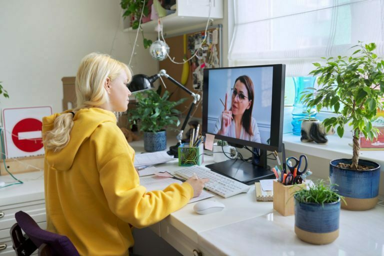 a person looking at a computer screen