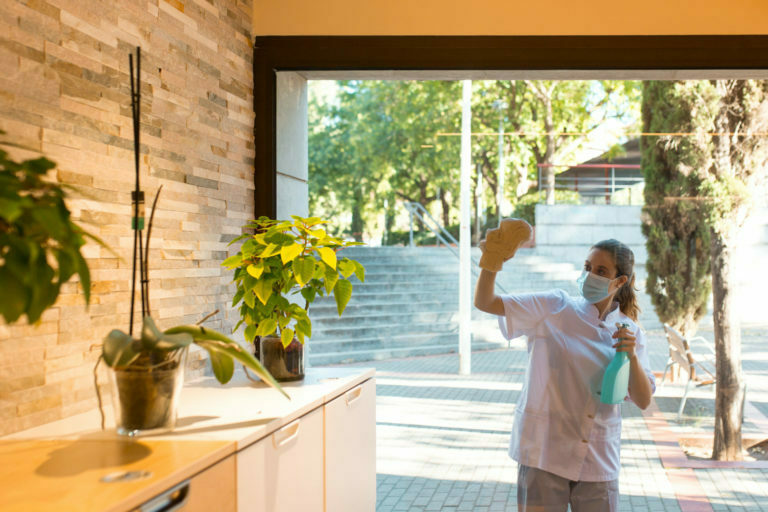 a person standing outside a window